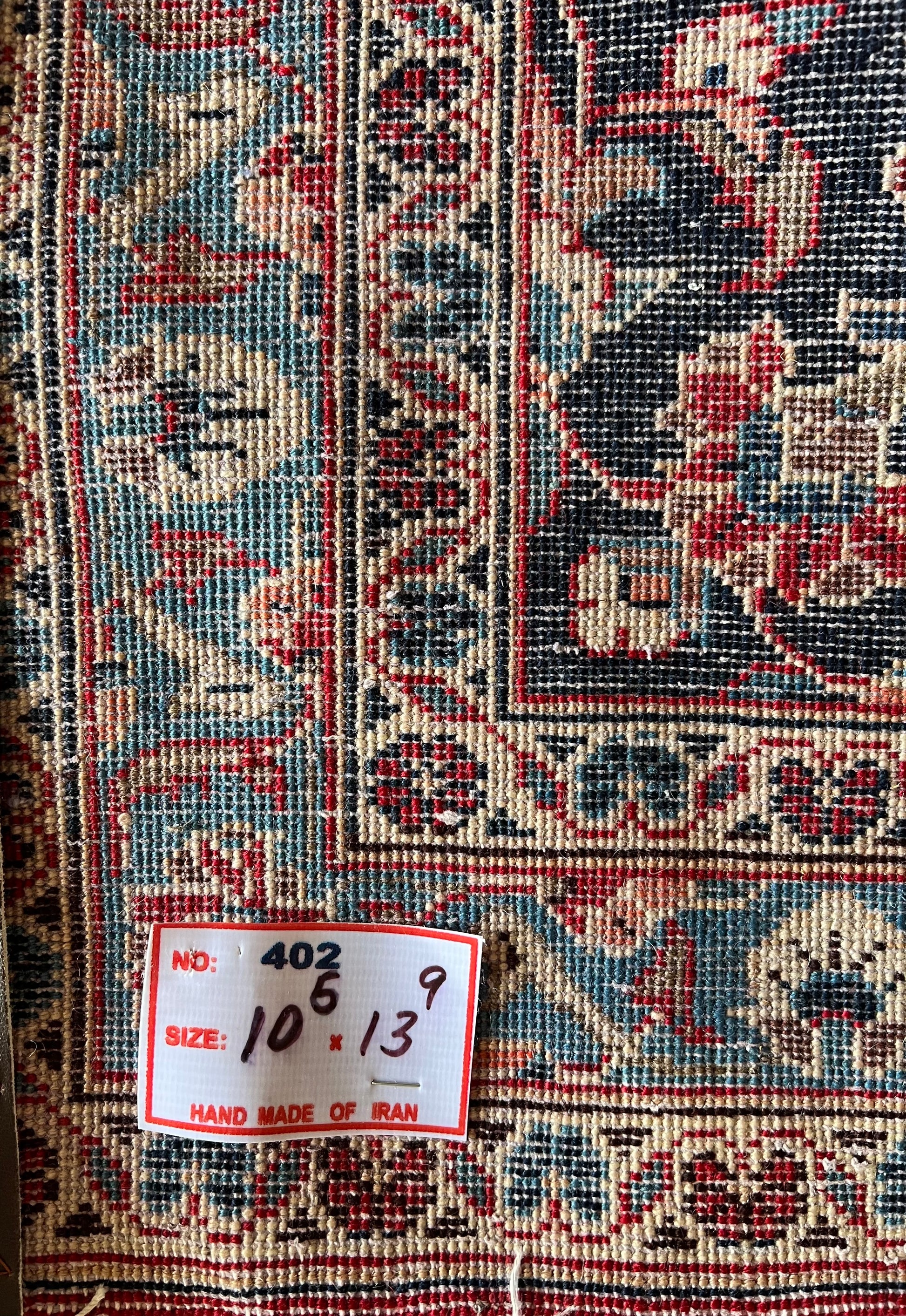 Back Corner of Lachlan Persian Kashan rug, highlighting detailed hand-knotted border and craftsmanship